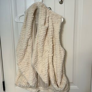 Size M cream furry vest.